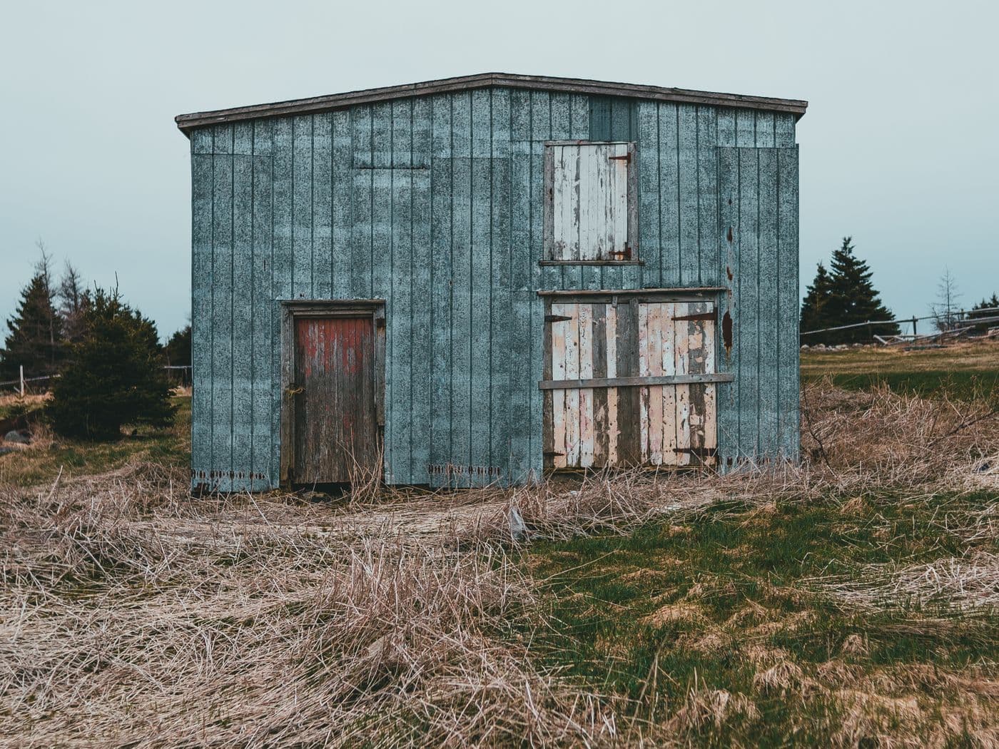 Weathered wooden shed ready to be torn down